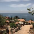 Photo overlooking buildings and the ocean