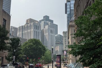 City sidewalk with buildings in background